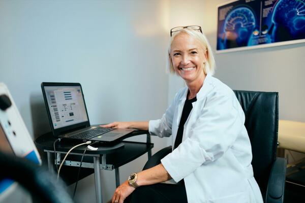 Portrait of Female Doctor working in Hospital Office