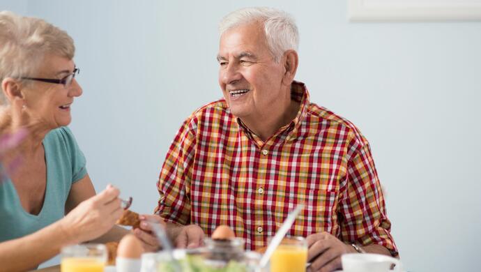 Elderly Couple Enjoy a Morning Meal