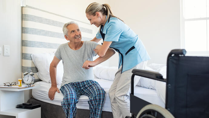 Nurse Helping Senior