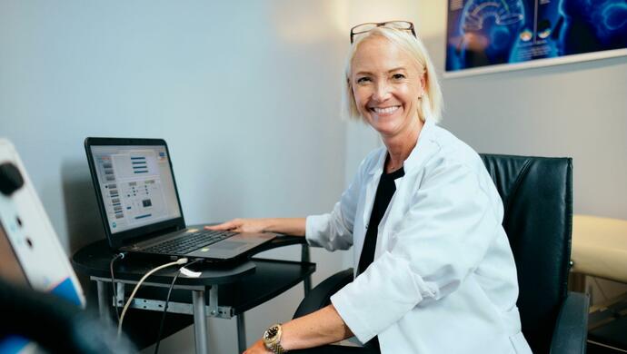 Portrait of Female Doctor working in Hospital Office